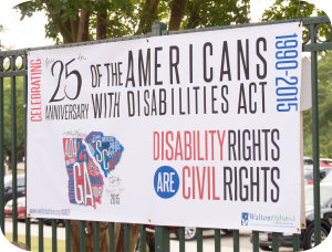 Banner with the 25th Anniversary of the ADA information on it for the CSRA Celebration during a Green Jackets Game.