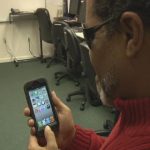Blind man demonstrates how he uses his smart phone apps to give him information that he can't see with his eyes.