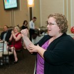 To accommodate our guests with hearing impairments, we had an ASL interpreter on hand for all of our speaking times. This is a great shot of her in action during the Half-time show.