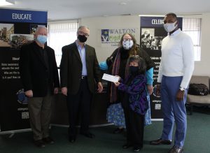 Check presentation at the Walton Options Augusta Office by GRI President, Dr. Dennis Skelley, and Board Chair, Brock Daniels, to Walton Options Executive Director, Tiffany Clifford, Board Chair, Rose Lawas-Smith, and Board Vice-Chair, James Heffner.